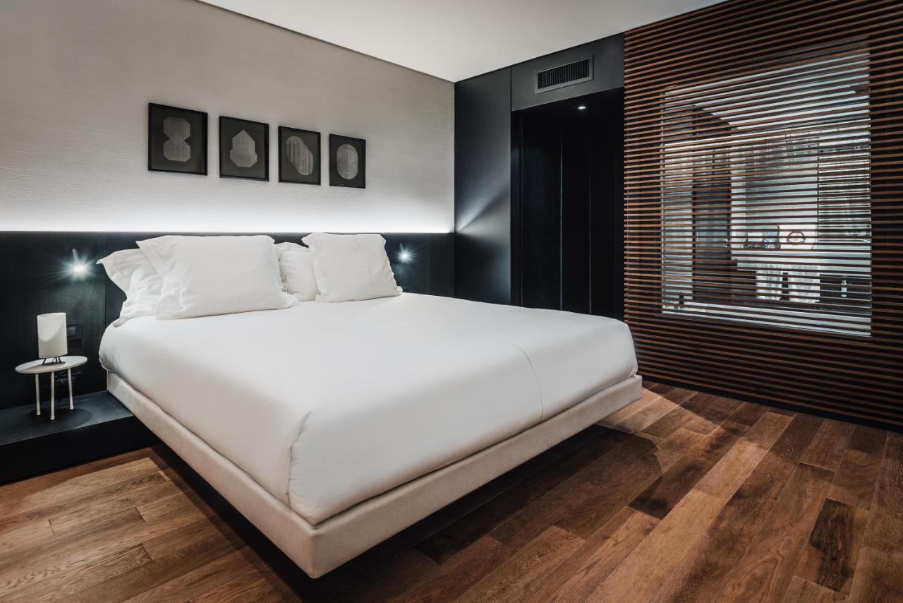Hotel SLS Buenos Aires Puerto Madero Exterior foto A bedroom at the hotel